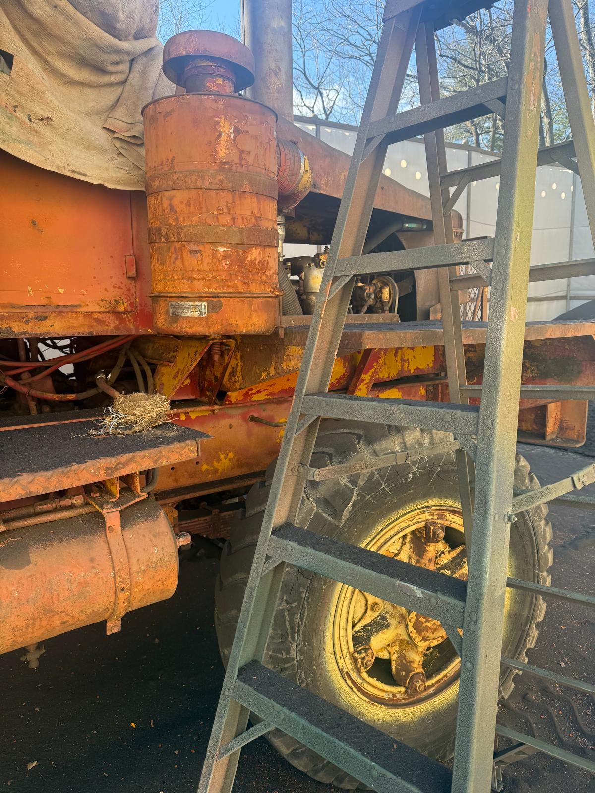 Rusted truck equipment before sandblasting